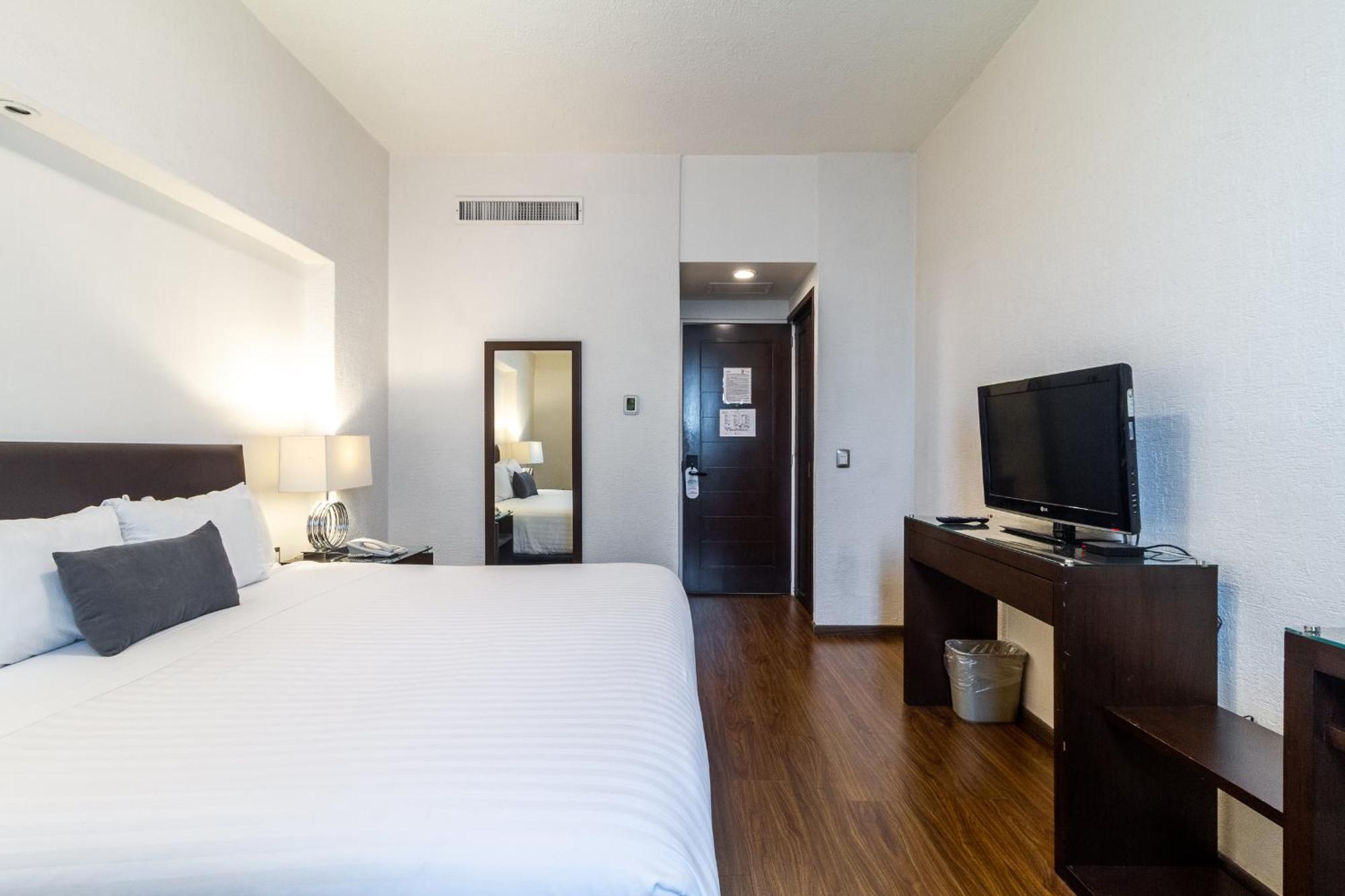 Meson Ejecutivo Guadalajara Minerva - Av Mexico Hotel Buitenkant foto